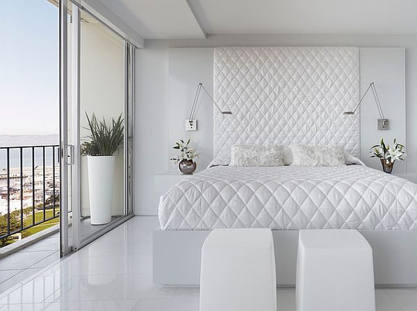 white bedroom with white flooring Bed quilt and head board
